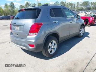 2020 Chevrolet Trax LT with VIN 3GNCJLSBXLL322296, listed as a IAAI auction lot 42030809 with 51,367 mi miles and . Bid and sale history available at DreamBid. Image 4.