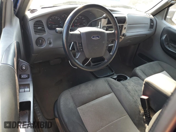 2009 Ford Ranger XLT with VIN 1FTZR45EX9PA64205, listed as a Copart auction lot 64789075 with 157,477 mi miles and Clean title. Bid and sale history available at DreamBid. Image 8.