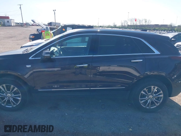 2021 Cadillac XT5 FWD Premium Luxury with VIN 1GYKNCRSXMZ118990, listed as a IAAI auction lot 41991857 with 92,085 mi miles and . Bid and sale history available at DreamBid. Image 14.