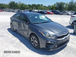 2021 Kia Forte LXS z VIN 3KPF24ADXME381074, wystawiony jako IAAI lot #40188418 z przebiegiem 67 559 mil mil oraz . Historia ofert i sprzedaży dostępna na DreamBid. Obrazek 1.