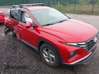 2022 Hyundai Tucson SEL z VIN 5NMJBCAE3NH039019, wystawiony jako IAAI lot #42187469 z przebiegiem 24 126 mil mil oraz . Historia ofert i sprzedaży dostępna na DreamBid. Obrazek 1.