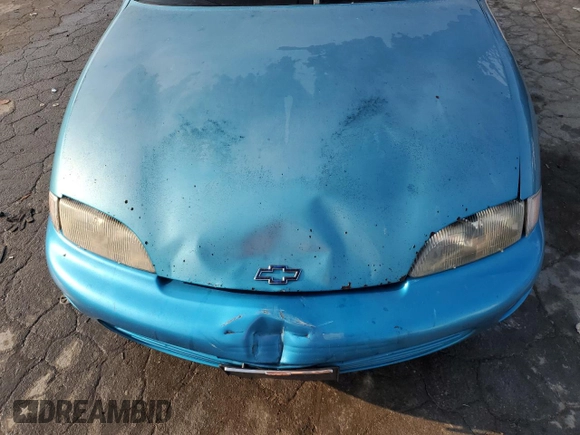 1999 Chevrolet Cavalier z VIN 1G1JC1240X7138164, wystawiony jako Copart lot #70324134 z przebiegiem 256 856 mil mil oraz Szkoda całkowita • Salvage title. Historia ofert i sprzedaży dostępna na DreamBid. Obrazek 11.