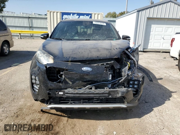 2018 Kia Sportage EX z VIN KNDPN3AC8J7450904, wystawiony jako Copart lot #76091074 z przebiegiem 104 850 mil mil oraz Szkoda całkowita • Salvage title. Historia ofert i sprzedaży dostępna na DreamBid. Obrazek 5.