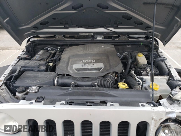 2013 Jeep Wrangler Unlimited Sport z VIN 1C4BJWDG2DL685896, wystawiony jako Copart lot #53951415 z przebiegiem 142 516 mil mil oraz Tytuł czysty. Historia ofert i sprzedaży dostępna na DreamBid. Obrazek 12.