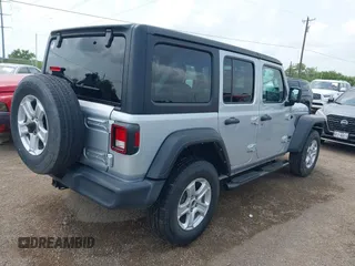 2022 Jeep Wrangler Unlimited Willys Sport with VIN 1C4HJXDM4NW175782, listed as a IAAI auction lot 42073544 with 129,299 mi miles and . Bid and sale history available at DreamBid. Image 4.