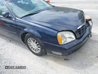 2004 Cadillac DeVille DHS z VIN 1G6KE54Y64U110060, wystawiony jako IAAI lot #42133610 z przebiegiem 68 677 mil mil oraz . Historia ofert i sprzedaży dostępna na DreamBid. Obrazek 13.