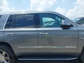 2020 Cadillac Escalade Luxury z VIN 1GYS3BKJ0LR116410, wystawiony jako IAAI lot #42274841 z przebiegiem 75 513 mil mil oraz . Historia ofert i sprzedaży dostępna na DreamBid. Obrazek 13.