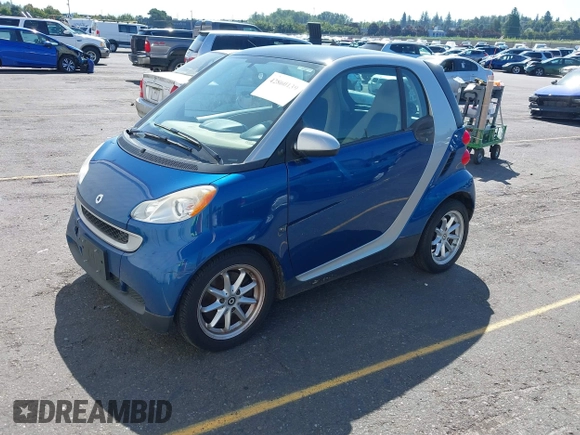 2009 Smart fortwo Pure with VIN WMEEJ31X19K243304, listed as a IAAI auction lot 42860139 with 119,617 mi miles and . Bid and sale history available at DreamBid. Image 2.