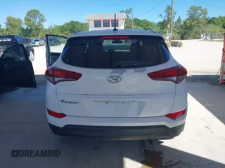 2017 Hyundai Tucson SE with VIN KM8J23A45HU328404, listed as a IAAI auction lot 41695180 with 120,458 mi miles. Bid and sale history available at carsss.com. Image 16.