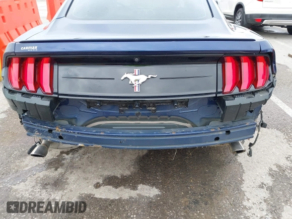 2020 Ford Mustang EcoBoost with VIN 1FA6P8TH2L5108722, listed as a IAAI auction lot 42182257 with 65,651 mi miles and . Bid and sale history available at DreamBid. Image 6.
