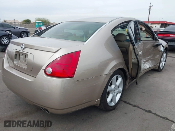 2004 Nissan Maxima SE with VIN 1N4BA41EX4C927086, listed as a IAAI auction lot 41734539 with 135,331 mi miles and . Bid and sale history available at DreamBid. Image 4.