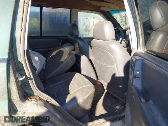 1997 Jeep Grand Cherokee Laredo with VIN 1J4GZ58S2VC605385, listed as a IAAI auction lot 41797715 with 169,996 mi miles and . Bid and sale history available at DreamBid. Image 8.