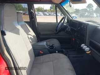 1996 Jeep Cherokee Sport with VIN 1J4FT68S4TL326973, listed as a IAAI auction lot 42744791 with 215,905 mi miles and . Bid and sale history available at DreamBid. Image 5.