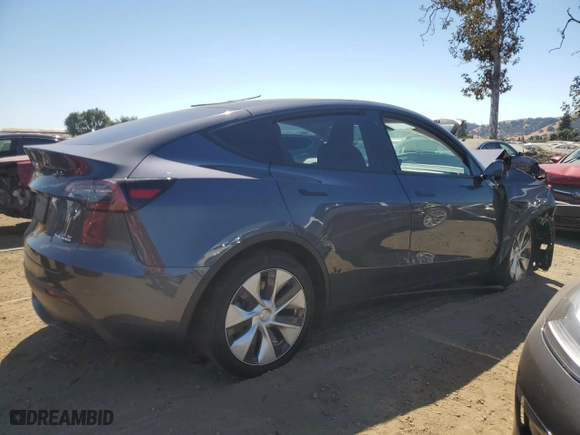 2022 Tesla Model Y Long Range with VIN 7SAYGAEE6NF345053, listed as a Copart auction lot 72465044 with 0 mi miles and Salvage Title. Bid and sale history available at carsss.com. Image 3.
