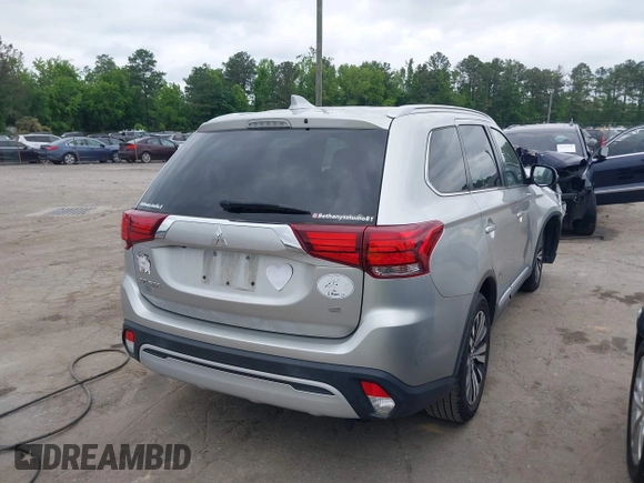 2020 Mitsubishi Outlander SE with VIN JA4AD3A39LZ034015, listed as a IAAI auction lot 42245374 with 92,992 mi miles and . Bid and sale history available at DreamBid. Image 4.