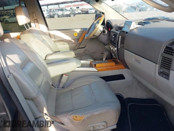2004 Infiniti QX56 with VIN 5N3AA08C34N803588, listed as a IAAI auction lot 41546043 with 190,599 mi miles. Bid and sale history available at carsss.com. Image 5.