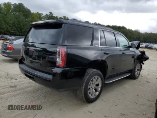 2017 GMC Yukon SLT with VIN 1GKS2BKC2HR406007, listed as a Copart auction lot 71702084 with 66,828 mi miles and Salvage Title. Bid and sale history available at carsss.com. Image 3.