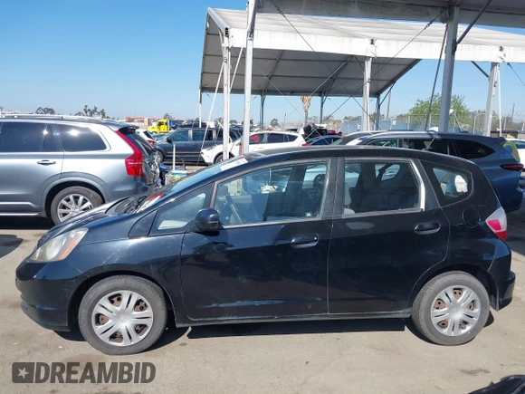 2010 Honda Fit with VIN JHMGE8H28AS012129, listed as a IAAI auction lot 41980485 with 144,170 mi miles. Bid and sale history available at carsss.com. Image 14.