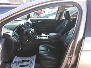 2021 Ford Edge Titanium z VIN 2FMPK3K93MBA50462, wystawiony jako IAAI lot #42185840 z przebiegiem 106 850 mil mil oraz . Historia ofert i sprzedaży dostępna na DreamBid. Obrazek 1.