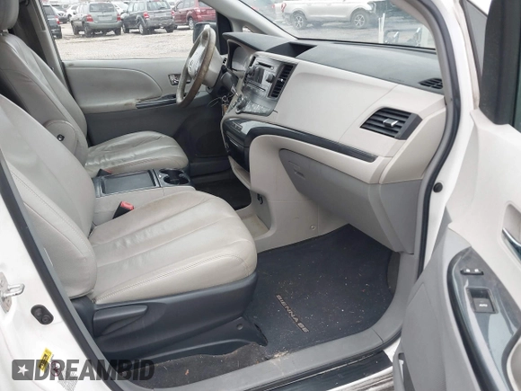 2011 Toyota Sienna SE with VIN 5TDXK3DC0BS122811, listed as a IAAI auction lot 41491159 with 337,201 mi miles and . Bid and sale history available at DreamBid. Image 5.