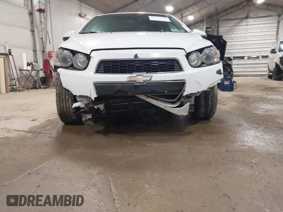 2014 Chevrolet Sonic LS with VIN 1G1JA6SG4E4208132, listed as a IAAI auction lot 38646142 with 154,013 mi miles and . Bid and sale history available at DreamBid. Image 6.