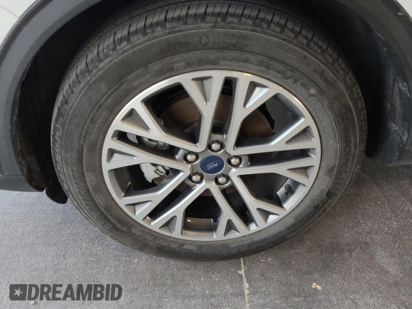 2021 Ford Escape SEL Hybrid with VIN 1FMCU9CZ1MUB25597, listed as a IAAI auction lot 42663573 with 79,061 mi miles and . Bid and sale history available at DreamBid. Image 51.