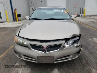 2004 Pontiac Bonneville SE z VIN 1G2HX52K44U242321, wystawiony jako Copart lot #43754495 z przebiegiem 222 658 mil mil oraz Szkody całkowita. Historia ofert i sprzedaży dostępna na DreamBid. Obrazek 5.