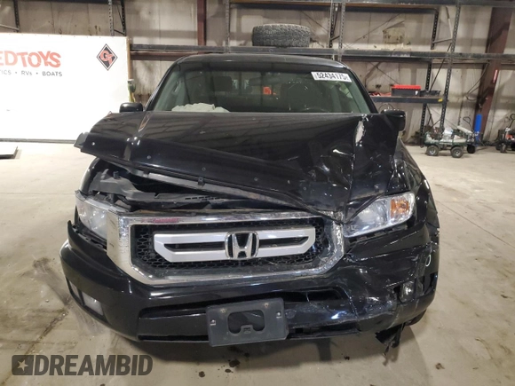 2010 Honda Ridgeline RTL with VIN 5FPYK1F5XAB011944, listed as a Copart auction lot 52434175 with 137,585 mi miles and Salvage title. Bid and sale history available at DreamBid. Image 5.