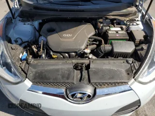 2015 Hyundai Veloster z VIN KMHTC6ADXFU222793, wystawiony jako Copart lot #57861415 z przebiegiem 98 318 mil mil oraz Szkoda całkowita • Salvage title. Historia ofert i sprzedaży dostępna na DreamBid. Obrazek 11.