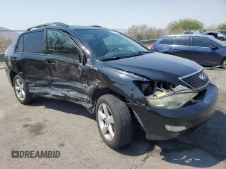 2005 Lexus RX 330 with VIN 2T2GA31U65C036959, listed as a Copart auction lot 64513135 with 128,900 mi miles and Salvage title. Bid and sale history available at DreamBid. Image 4.