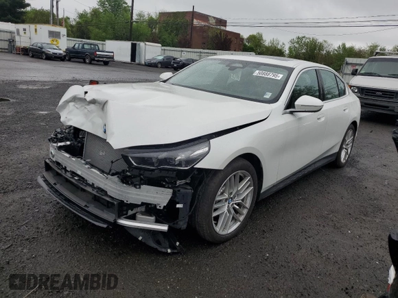 2024 BMW 5 Series 530i xDrive with VIN WBA53FJ01RCP97253, listed as a Copart auction lot 50888795 with 11,985 mi miles and Salvage title. Bid and sale history available at DreamBid. Image 1.