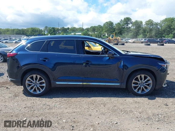 2019 Mazda CX-9 Grand Touring with VIN JM3TCBDY6K0335886, listed as a IAAI auction lot 42704250 with 37,171 mi miles and . Bid and sale history available at DreamBid. Image 12.