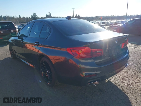 2018 BMW 5 Series 540i with VIN WBAJE5C58JG918692, listed as a IAAI auction lot 41665415 with 61,261 mi miles and . Bid and sale history available at carsss.com. Image 3.