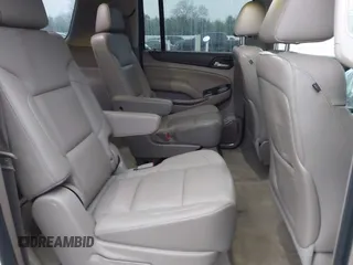 2015 GMC Yukon XL SLT with VIN 1GKS1HKC7FR223513, listed as a IAAI auction lot 40822575 with 128,239 mi miles. Bid and sale history available at carsss.com. Image 8.