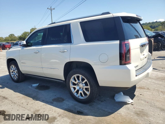 2015 GMC Yukon Denali with VIN 1GKS2CKJ3FR663324, listed as a Copart auction lot 70306614 with 154,234 mi miles and Salvage Title. Bid and sale history available at carsss.com. Image 2.