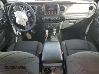 2023 Jeep Wrangler Sport S with VIN 1C4HJXDGXPW665818, listed as a Copart auction lot 48357105 with 9,803 mi miles and Clean Title. Bid and sale history available at DreamBid. Image 8.