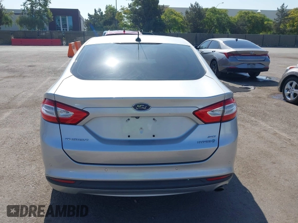 2016 Ford Fusion SE Hybrid z VIN 3FA6P0LU8GR203934, wystawiony jako IAAI lot #42595741 z przebiegiem 84 189 mil mil oraz . Historia ofert i sprzedaży dostępna na DreamBid. Obrazek 17.