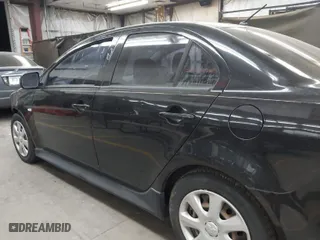 2014 Mitsubishi Lancer ES with VIN JA32U2FU4EU016428, listed as a IAAI auction lot 40966226 with 82,674 mi miles. Bid and sale history available at carsss.com. Image 14.