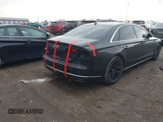 2015 Audi A8 L 4.0T with VIN WAU32AFD5FN026108, listed as a IAAI auction lot 41652860 with 148,253 mi miles. Bid and sale history available at carsss.com. Image 4.