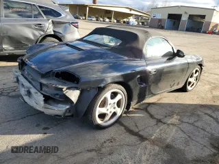 2000 Porsche Boxster z VIN WP0CA2980YU626358, wystawiony jako Copart lot #36977344 z przebiegiem 117 561 mil mil oraz Szkoda całkowita • Salvage title. Historia ofert i sprzedaży dostępna na DreamBid. Obrazek 3.