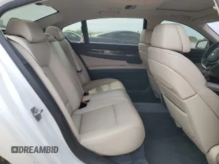2012 BMW 7 Series 750Li xDrive with VIN WBAKC8C57CC436737, listed as a Copart auction lot 52068285 with 125,582 mi miles and Salvage Title. Bid and sale history available at carsss.com. Image 10.