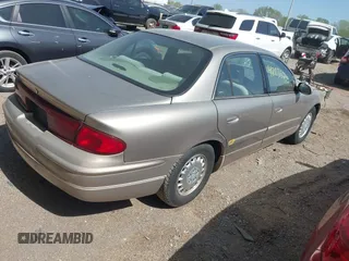 1997 Buick Regal LS with VIN 2G4WB52K9V1435882, listed as a IAAI auction lot 42135703 with 64,434 mi miles. Bid and sale history available at carsss.com. Image 4.