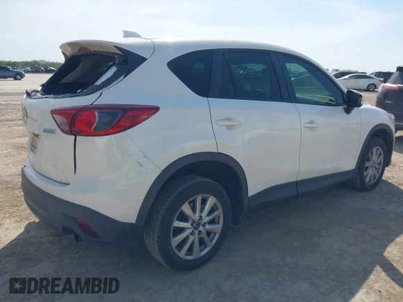 2013 Mazda CX-5 Sport z VIN JM3KE2BE5D0135213, wystawiony jako IAAI lot #42270730 z przebiegiem 140 917 mil mil oraz . Historia ofert i sprzedaży dostępna na DreamBid. Obrazek 4.