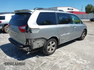 2016 Toyota Sienna LE AAS with VIN 5TDKK3DC8GS728746, listed as a IAAI auction lot 41771751 with 148,774 mi miles. Bid and sale history available at carsss.com. Image 4.