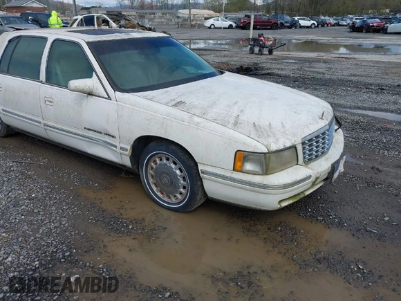 1999 Cadillac DeVille z VIN 1G6KD54Y5XU780836, wystawiony jako IAAI lot #41986180 z przebiegiem Nie podano mil oraz . Historia ofert i sprzedaży dostępna na DreamBid. Obrazek 1.
