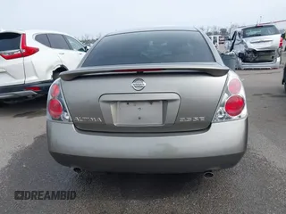 2006 Nissan Altima SL z VIN 1N4BL11D96C251717, wystawiony jako IAAI lot #41566215 z przebiegiem 189 431 mil mil oraz . Historia ofert i sprzedaży dostępna na DreamBid. Obrazek 16.