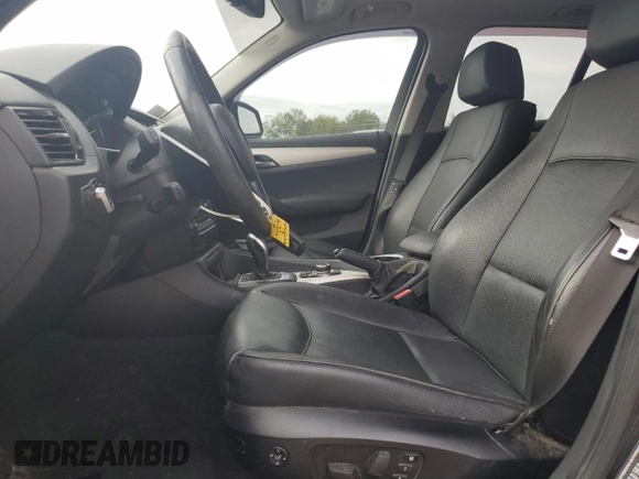 2015 BMW X1 xDrive28i with VIN WBAVL1C58FVY39591, listed as a Copart auction lot 73548684 with 152,569 mi miles and Salvage Title. Bid and sale history available at carsss.com. Image 7.