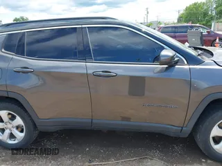 2018 Jeep Compass Latitude with VIN 3C4NJDBB5JT355582, listed as a IAAI auction lot 42351818 with 75,324 mi miles and . Bid and sale history available at DreamBid. Image 14.