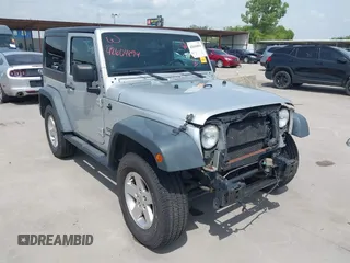 2012 Jeep Wrangler Sport with VIN 1C4AJWAG0CL273233, listed as a IAAI auction lot 42604894 with 119,103 mi miles and . Bid and sale history available at DreamBid. Image 1.