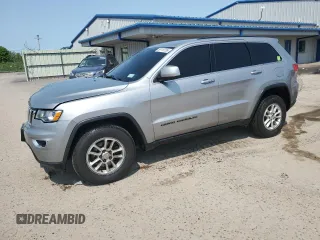 2018 Jeep Grand Cherokee Laredo with VIN 1C4RJFAG6JC188526, listed as a Copart auction lot 59118735 with 167,857 mi miles and Salvage title. Bid and sale history available at DreamBid. Image 1.